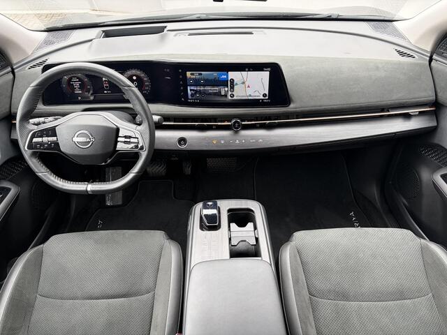 Nissan Ariya Evolve 91 kWh / SOH 99% / Stoelverwarming voor en achter / Schuif-kantel dak / Stoelventilatie / Stuurverwarming / 100% dealer onderhouden / Elektrisch verstelbare stoelen met geheugen / Elektrische achterklep / Adaptieve cruise control / Apple Carplay/Android Auto /