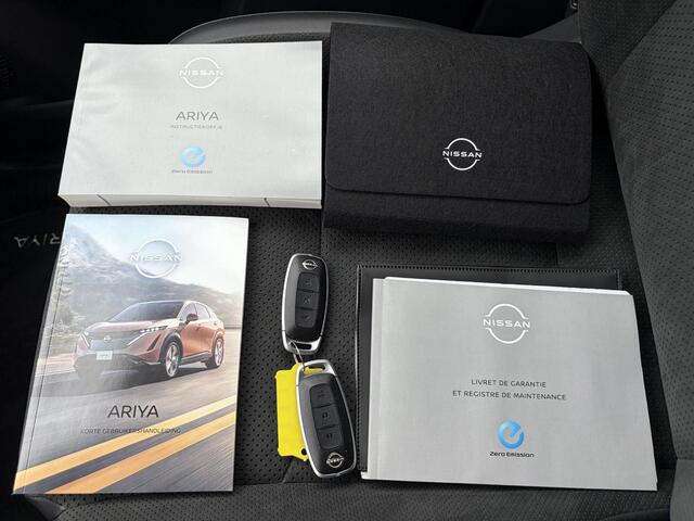 Nissan Ariya Evolve 91 kWh / SOH 99% / Stoelverwarming voor en achter / Schuif-kantel dak / Stoelventilatie / Stuurverwarming / 100% dealer onderhouden / Elektrisch verstelbare stoelen met geheugen / Elektrische achterklep / Adaptieve cruise control / Apple Carplay/Android Auto /