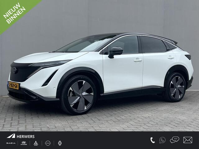 Nissan Ariya Evolve 91 kWh / 10 Jaar Nissan More / 100% Dealer Onderhouden /Schuif-Kantel Dak / Stoelventilatie / Stuurverwarming / Elektrisch Verstelbare Bst.stoel Met Geheugen / Elektrische Achterklep / Adaptieve Cruise Control / Apple Carplay/Android Auto /