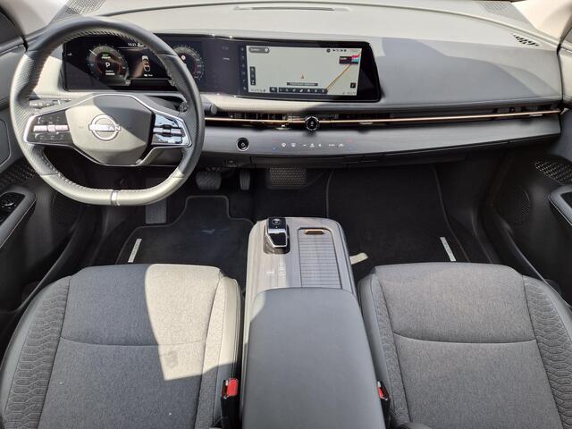 Nissan Ariya Advance 91 kWh / SOH 99% / Fabrieksgarantie tot 12-2027 / CCS snelladen / warmtepomp / Stuur- Stoel & Voorruitverwarming / Apple Carplay Android Auto / Adaptief cruise control / Keyless Enty/Start / Elektrische achterklep /