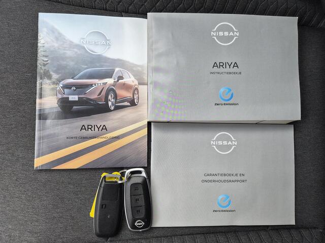 Nissan Ariya Advance 91 kWh / SOH 99% / Fabrieksgarantie tot 12-2027 / CCS snelladen / warmtepomp / Stuur- Stoel & Voorruitverwarming / Apple Carplay Android Auto / Adaptief cruise control / Keyless Enty/Start / Elektrische achterklep /
