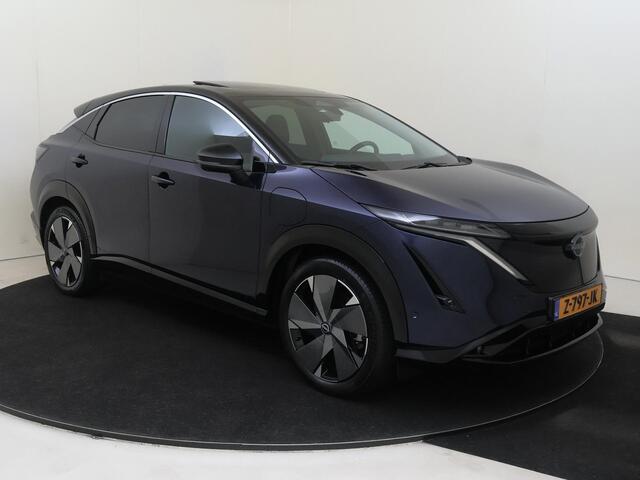 Nissan Ariya Evolve 91 kWh | Apple Carplay/Android | cruise control adaptief | elektrisch glazen panorama-dak | lederen/microvezel bekleding | navigatiesysteem full map | voorstoelen verwarmd en geventileerd | warmtepomp | lichtmetalen velgen |