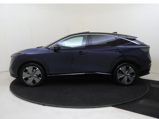 Nissan Ariya Evolve 91 kWh | Apple Carplay/Android | cruise control adaptief | elektrisch glazen panorama-dak | lederen/microvezel bekleding | navigatiesysteem full map | voorstoelen verwarmd en geventileerd | warmtepomp | lichtmetalen velgen |