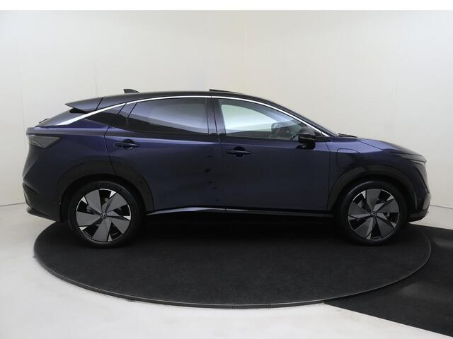 Nissan Ariya Evolve 91 kWh | Apple Carplay/Android | cruise control adaptief | elektrisch glazen panorama-dak | lederen/microvezel bekleding | navigatiesysteem full map | voorstoelen verwarmd en geventileerd | warmtepomp | lichtmetalen velgen |