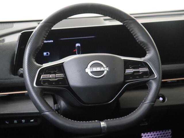 Nissan Ariya Evolve 91 kWh | Apple Carplay/Android | cruise control adaptief | elektrisch glazen panorama-dak | lederen/microvezel bekleding | navigatiesysteem full map | voorstoelen verwarmd en geventileerd | warmtepomp | lichtmetalen velgen |