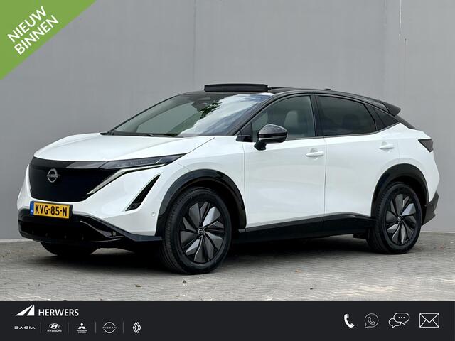 Nissan Ariya e-4ORCE Evolve 91 kWh 4WD / 306 PK / Leder / 1.500 kg Trekgewicht / Warmtepomp / 10 jaar Nissan More Garantie / Stoelverwarming voor en achter / Schuif-kantel dak / Stoelventilatie / Stuurverwarming / Rondomzicht camera / Elektrisch verstelbare stoelen met geheugen / Elektrische achterklep / Adaptieve cruise control / Apple Carplay/Android Auto /