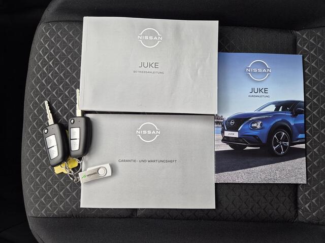 Nissan JUKE 1.0 DIG-T Acenta Handgeschakeld / Nissan Connect Navigatie / Stoelverwarming / Cruise control / Achteruitrijcamera / Apple Carplay Android Auto / Climate control / Allseason Banden /