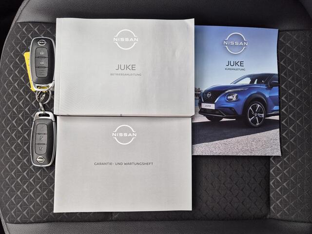 Nissan JUKE 1.0 DIG-T N-Connecta Handgeschakeld / Cold pack / Allseason banden / Apple Carplay Android Auto / Stuur-, Stoel en Voorruitverwarming / Achteruitrijcamera / Cruise control / Draadloze telefoon lader /