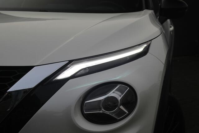 Nissan JUKE 1.0 DIG-T Enigma | Incl. 12 maanden garantie | Bluetooth | Climate control | Cruise control | Airco | Achteruitrijcamera | DAB | Lane assist | Parkeer sensoren | Digitaal instrumentenpaneel | Lichtmetalen velgen