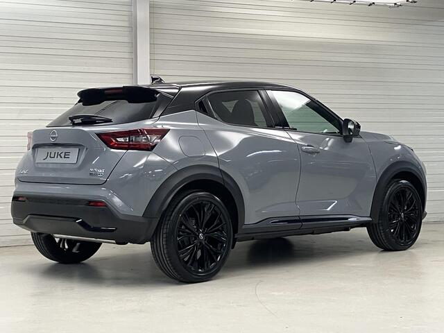 Nissan JUKE 1.6 Hybrid N-Sport / ¤4.500,- Nissan Voorraadvoordeel / Nieuw uit voorraad leverbaar / Stoel- en Stuurverwarming / Verwarmde Voorruit / Adaptive Cruise Control / 360 Graden Camera / Dodehoek Detectie / Navigatie /