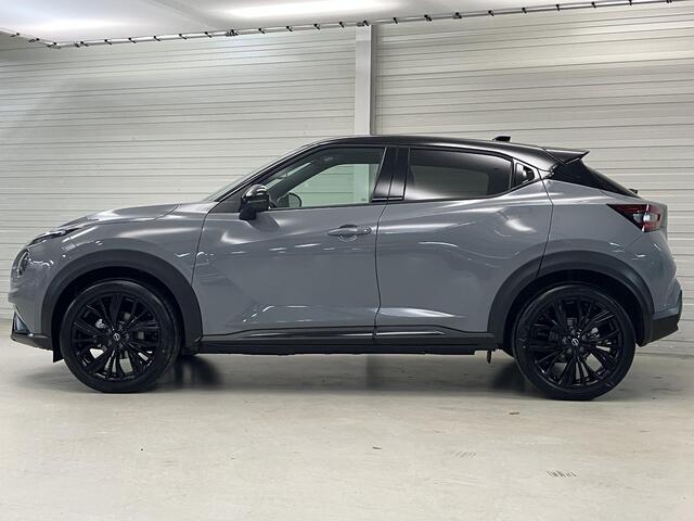 Nissan JUKE 1.6 Hybrid N-Sport / ¤4.500,- Nissan Voorraadvoordeel / Nieuw uit voorraad leverbaar / Stoel- en Stuurverwarming / Verwarmde Voorruit / Adaptive Cruise Control / 360 Graden Camera / Dodehoek Detectie / Navigatie /