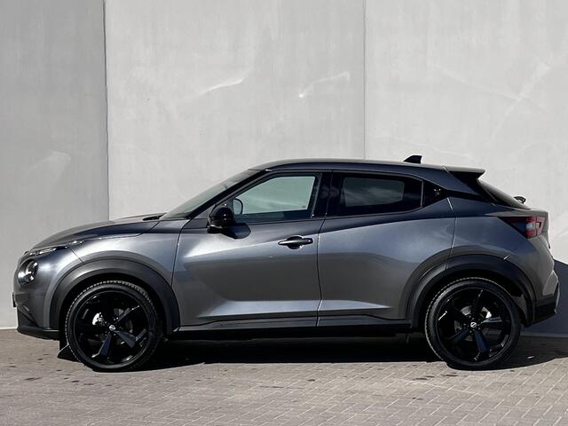 Nissan JUKE 1.0 DIG-T Tekna / Fabrieksgarantie tot 03-2028 <100.000 km / Automaat / Leder / Camera 360° / Cold Pack / Stuur-, stoel- & voorruitverwarming / Navigatie / Apple Carplay Android / 19" LM + All Season banden /