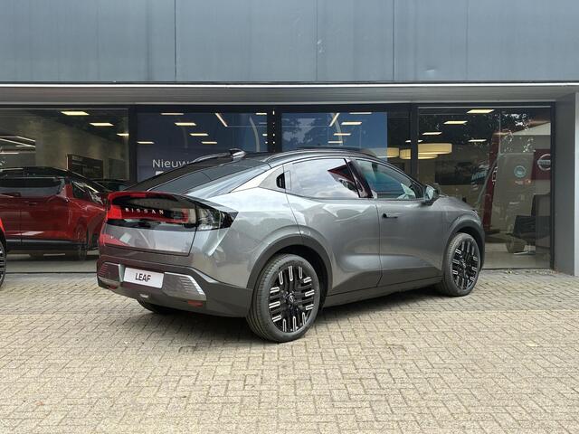 Nissan LEAF Evolve 52 kWh DEMO | Lederen bekleding | Stoel- en stuurverwarming | Stoelmassage | Climate Control | Parkeersensoren voor- en achter | Warmtepomp | Navigatiesysteem | BOSE Soundsystem | Head-up Display | Dimmend panoramisch dak | Fabrieksgarantie