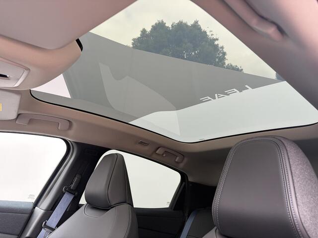 Nissan LEAF Evolve 75 kWh / 10 Jaar Nissan More / Panoramadak / Adaptief Cruise Control / Elektr. Voorstoelen / Massage Functie Bestuurder / Apple Carplay&Android Auto / Dab / Elektr. Achterklep / Cold Pack / Warmte Pomp /