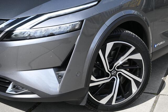 Nissan QASHQAI 1.5 e-Power Tekna Plus | 360 CAMERA | PANORAMADAK | LEDER | STUUR/STOELVERWARMING | NAVI | HUD | ADAPT. CRUISE CONTROL | BOSE | CLIMATE CONTROL | ALL-SEASONBANDEN | PDC | LMV