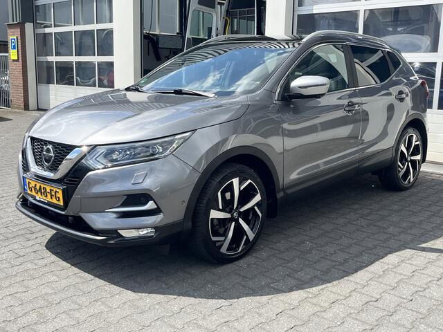 Nissan QASHQAI 1.3 DIG-T Tekna Airco Cruise controle Lederbekleding Navigatiesysteem 360°camera Panoramadak Trekhaak 1300kg trekgewicht Stuurwielbediening Stoelverwarming
