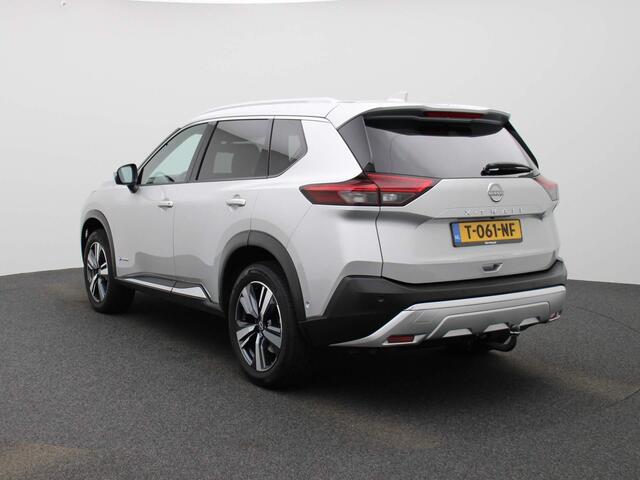 Nissan X-TRAIL 1.5 e-4orce Tekna 4WD 7p. 214pk | Afneembare Trekhaak | Glazen Schuif-Kanteldak | Stoel- & Stuurwielverwarming | 360-graden Camera | ProPilot | Achterbank Verwarmd | Lederen Bekleding | Memory Seats | Elektrische Achterklep
