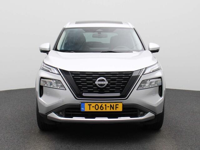 Nissan X-TRAIL 1.5 e-4orce Tekna 4WD 7p. 214pk | Afneembare Trekhaak | Glazen Schuif-Kanteldak | Stoel- & Stuurwielverwarming | 360-graden Camera | ProPilot | Achterbank Verwarmd | Lederen Bekleding | Memory Seats | Elektrische Achterklep