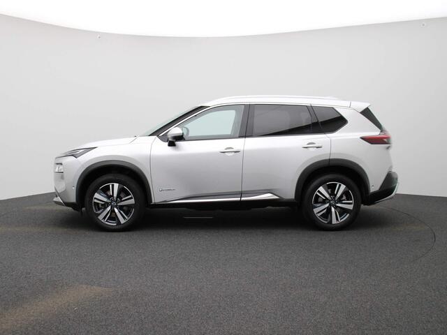 Nissan X-TRAIL 1.5 e-4orce Tekna 4WD 7p. 214pk | Afneembare Trekhaak | Glazen Schuif-Kanteldak | Stoel- & Stuurwielverwarming | 360-graden Camera | ProPilot | Achterbank Verwarmd | Lederen Bekleding | Memory Seats | Elektrische Achterklep