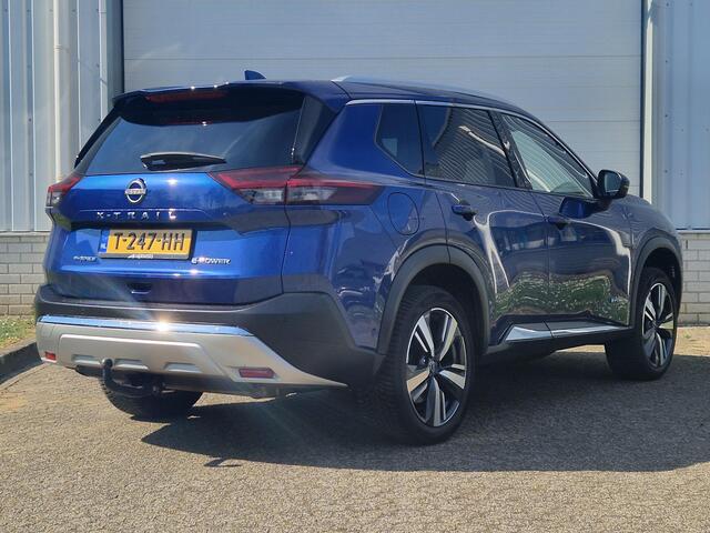 Nissan X-TRAIL 1.5 e-4orce Tekna 4WD 7p. AUTOMAAT / Trekhaak / Voorstoelen, stuurwiel en voorruit verwarmd / Rondomzicht camera / Head Up Display / Adaptief Cruise Control / Navigatiesysteem full map / Lichtmetalen velgen 19" / Climate Control / Apple Carplay & Android 