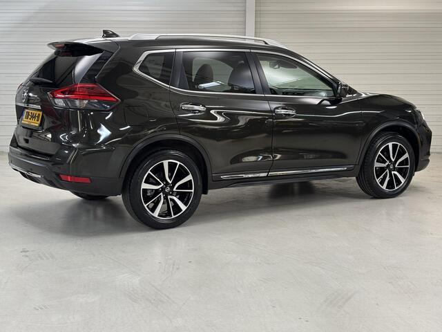 Nissan X-TRAIL 1.6 DIG-T Tekna / Metaalkleur / Luxe lederen bekleding / Voorstoelen, stuurwiel en achterbank verwarmd / Rondomzichtcamera / Navigatiesysteem full map / Licht metalen velgen 19" / Elektrisch glazen panorama dak / Dode hoek detectie / Automatische airco / 
