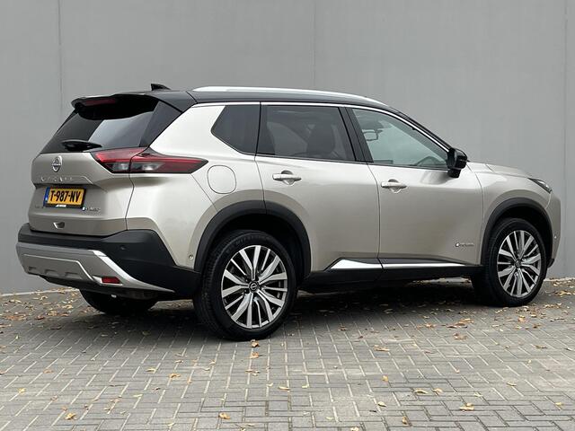 Nissan X-TRAIL 1.5 e-4orce Tekna Plus 4WD / Glazen Schuif- en Kanteldak / 360° Camera / HUD / 1800kg trekken / Apple Carplay & Android Auto / Elektrisch Verstelbare Voorstoelen met geheugenset / Elektrische Achterklep / Stuur- en Stoelverwarming / Voorruitverwarming /