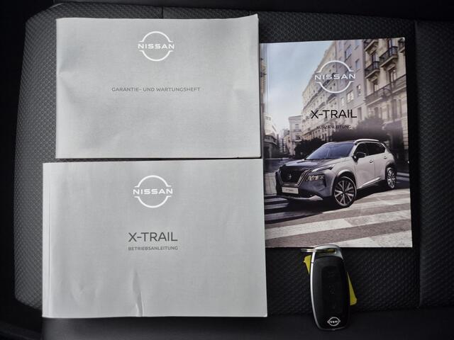 Nissan X-TRAIL 1.5 e-4orce N-Trek 4WD Automaat / Fabrieksgarantie tot 07-2027 / Dealer onderhouden / Trekhaak afneembaar / Trekgewicht 1.800Kg / Stuur-, Stoel en Achterbank verwarming / Rondomzicht camera / Adaptief CC / Climate control /