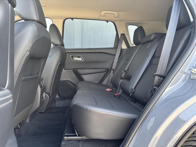 Nissan X-TRAIL 1.5 e-4orce Tekna 4WD Automaat / 1800 kg Trekgewicht / Fabrieksgarantie tot 07-2028<100.000km / Dealer onderhouden / All Season banden / Head Up Display / Elektrische achterklep / Adaptief cruise control / Rondomzicht camera /