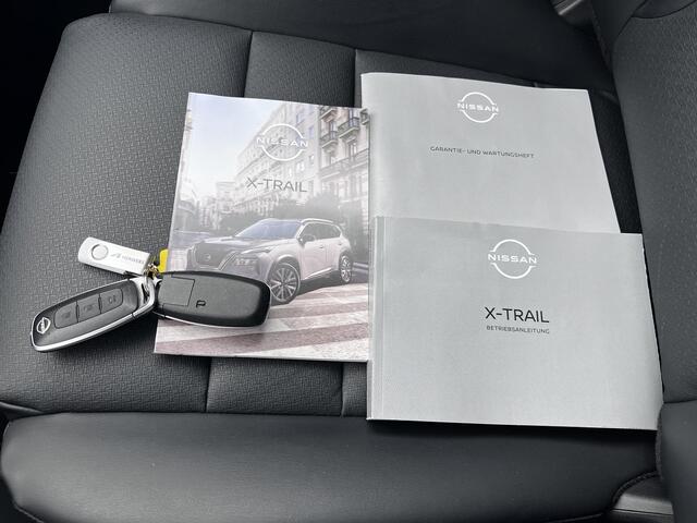 Nissan X-TRAIL 1.5 MHEV Tekna / 2000kg Trekgewicht GRATIS Vaste Trekhaak / HUD / Elektrische achterklep / Apple Carplay Android Auto / Stuur-, Stoel en achterbankverwarming / Adaptief CC / 360 ° camera / Voorruit verwarming /