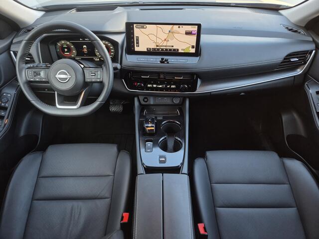 Nissan X-TRAIL 1.5 e-Power Tekna Automaat / Schuifdak / Fabrieksgarantie tot 04-2028<100.000 / All season banden / Head Up Display / Elektrische achterklep / / Stuur-, Stoel & Achterbank verwarming / Adaptief cruise control /