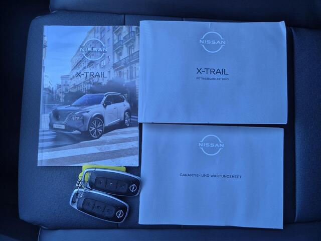 Nissan X-TRAIL 1.5 e-Power Tekna Automaat / Schuifdak / Fabrieksgarantie tot 04-2028<100.000 / All season banden / Head Up Display / Elektrische achterklep / / Stuur-, Stoel & Achterbank verwarming / Adaptief cruise control /