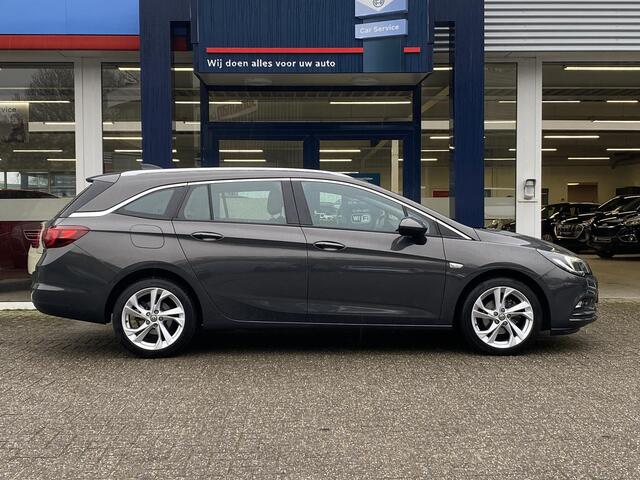 Opel ASTRA Sports Tourer 1.4 Innovation / NL-Auto / 150 PK / Dealer-Onderhouden / 2e-Eigenaar / Apple-Carplay / Android-Auto / Cruise-Control / Keyless / Radio-Bluetooth / Navi / DAB / PDC V+A / Elektr kofferklep / 17'' LMV / ENZ.