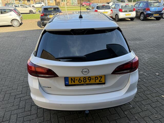 Opel ASTRA Sports Tourer 1.2 Design & Tech / Airco/ Navigatie/ Apple carplay/ Cruise/ Camera/ PDC/ LMV/ Trekhaak