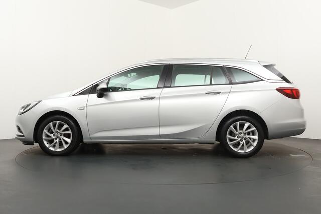 Opel ASTRA Sports Tourer BWJ 2019 | 1.0 Turbo 105PK Innovation | CLIMA | CAMERA A | CARPLAY | NAVI | EL. KOFFERKLEP | PDC | PRIVACY GLASS | KEYLESS |