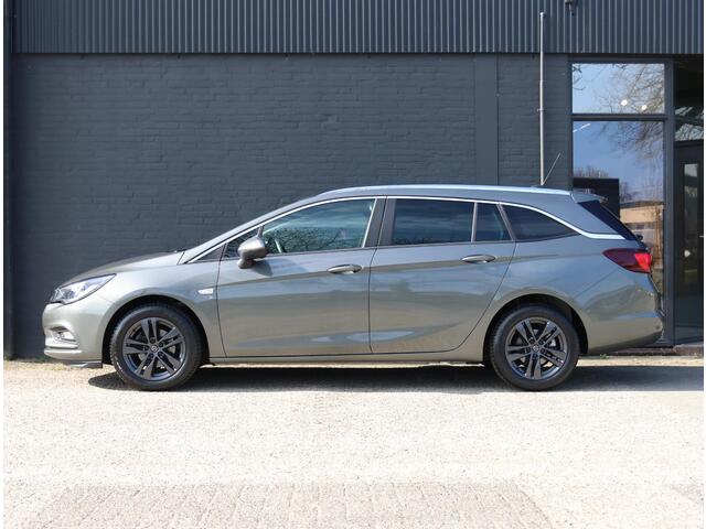 Opel ASTRA Wagon 105pk Turbo 120 Jaar Edition | 1ste eigenaar | AGR stoelen | Climate | Parkeersensoren | Navigatie