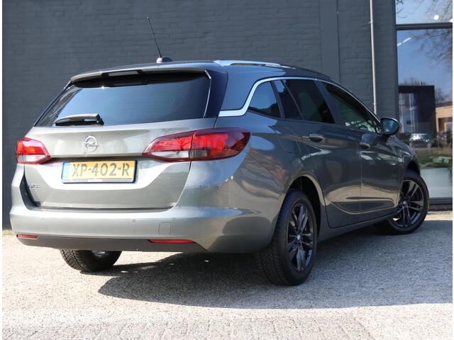 Opel ASTRA Wagon 105pk Turbo 120 Jaar Edition | 1ste eigenaar | AGR stoelen | Climate | Parkeersensoren | Navigatie