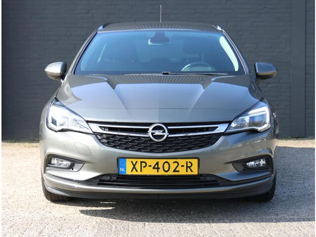 Opel ASTRA Wagon 105pk Turbo 120 Jaar Edition | 1ste eigenaar | AGR stoelen | Climate | Parkeersensoren | Navigatie