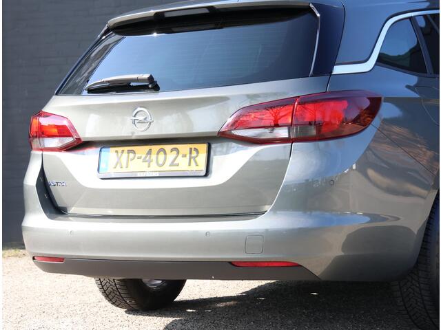 Opel ASTRA Wagon 105pk Turbo 120 Jaar Edition | 1ste eigenaar | AGR stoelen | Climate | Parkeersensoren | Navigatie