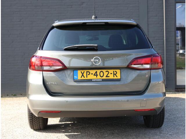 Opel ASTRA Wagon 105pk Turbo 120 Jaar Edition | 1ste eigenaar | AGR stoelen | Climate | Parkeersensoren | Navigatie