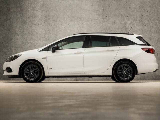 Opel ASTRA Sports Tourer 1.2 Sport (APPLE CARPLAY, NAVIGATIE, CAMERA, LED KOPLAMPEN, LEDER, SPORTSTOELEN, GETINT GLAS, PARKEERSENSOREN, DAB+, NIEUWSTAAT)