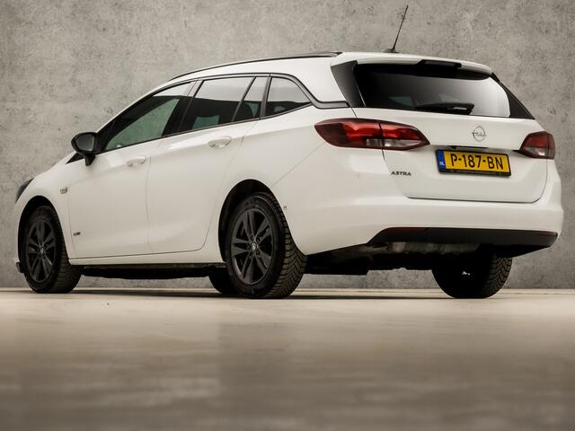 Opel ASTRA Sports Tourer 1.2 Sport (APPLE CARPLAY, NAVIGATIE, CAMERA, LED KOPLAMPEN, LEDER, SPORTSTOELEN, GETINT GLAS, PARKEERSENSOREN, DAB+, NIEUWSTAAT)
