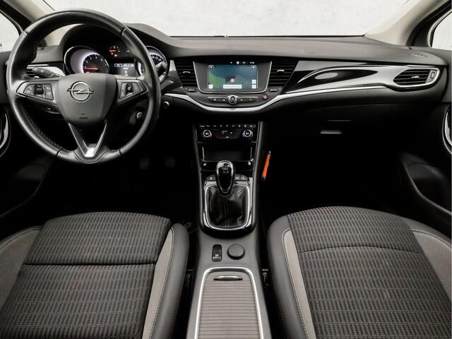 Opel ASTRA Sports Tourer 1.2 Sport (APPLE CARPLAY, NAVIGATIE, CAMERA, LED KOPLAMPEN, LEDER, SPORTSTOELEN, GETINT GLAS, PARKEERSENSOREN, DAB+, NIEUWSTAAT)
