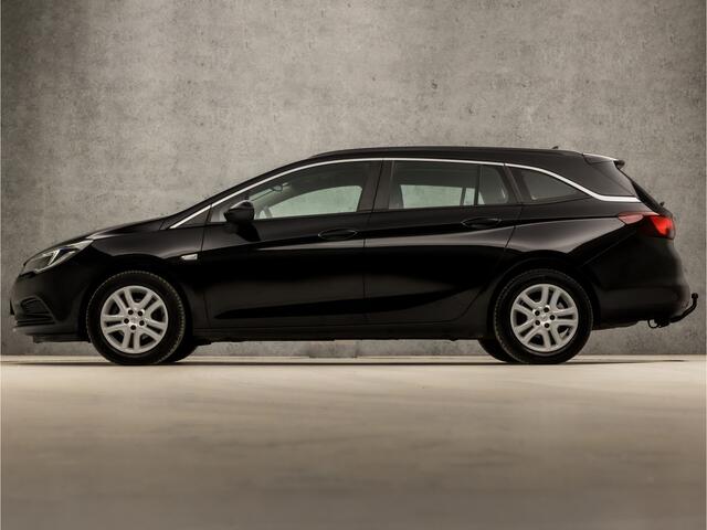 Opel ASTRA Sports Tourer 1.4 Luxury 150Pk (APPLE CARPLAY, GROOT NAVI, CRUISE, DAB+, SPORTSTOELEN, TREKHAAK, PARKEERSENSOREN, LM VELGEN, NIEUWE APK, NIEUWSTAAT)