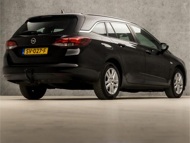 Opel ASTRA Sports Tourer 1.4 Luxury 150Pk (APPLE CARPLAY, GROOT NAVI, CRUISE, DAB+, SPORTSTOELEN, TREKHAAK, PARKEERSENSOREN, LM VELGEN, NIEUWE APK, NIEUWSTAAT)