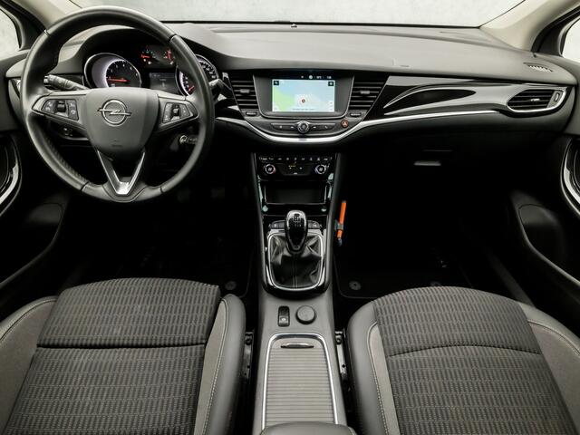 Opel ASTRA Sports Tourer 1.2 Sport (APPLE CARPLAY, NAVIGATIE, CAMERA, CLIMATE, LEDER, DAB+, SPORTSTOELEN, LED KOPLAMPEN, PARKEERSENSOREN, NIEUWE APK, NIEUWSTAAT)