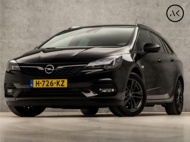 Opel ASTRA Sports Tourer 1.2 Sport (APPLE CARPLAY, NAVIGATIE, CLIMATE, ADAPTIVE CRUISE, GETINT GLAS, KOPLAMPEN, SPORTSTOELEN, PARKEERSENSOREN, NIEUWSTAAT)