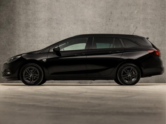 Opel ASTRA Sports Tourer 1.2 Sport (APPLE CARPLAY, NAVIGATIE, CLIMATE, ADAPTIVE CRUISE, GETINT GLAS, KOPLAMPEN, SPORTSTOELEN, PARKEERSENSOREN, NIEUWSTAAT)