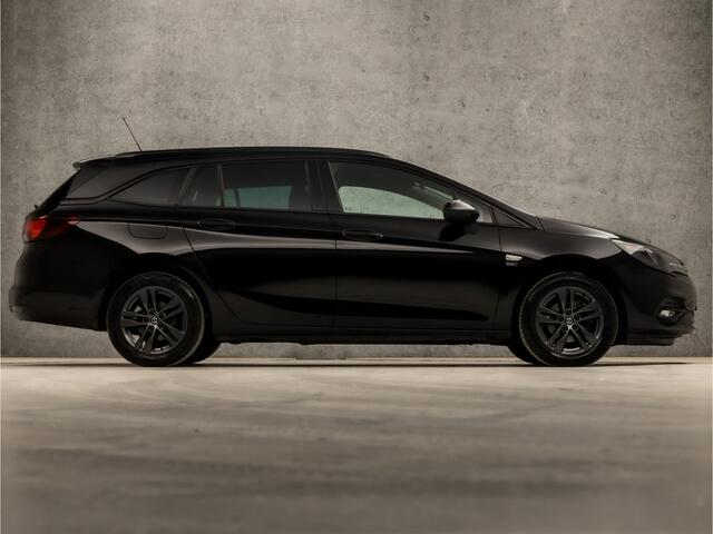 Opel ASTRA Sports Tourer 1.2 Sport (APPLE CARPLAY, NAVIGATIE, CLIMATE, ADAPTIVE CRUISE, GETINT GLAS, KOPLAMPEN, SPORTSTOELEN, PARKEERSENSOREN, NIEUWSTAAT)