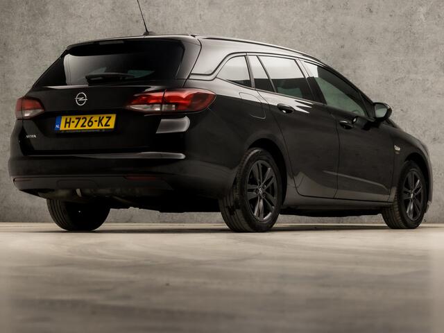Opel ASTRA Sports Tourer 1.2 Sport (APPLE CARPLAY, NAVIGATIE, CLIMATE, ADAPTIVE CRUISE, GETINT GLAS, KOPLAMPEN, SPORTSTOELEN, PARKEERSENSOREN, NIEUWSTAAT)