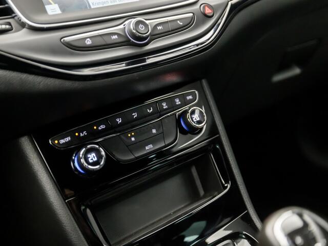 Opel ASTRA Sports Tourer 1.2 Sport (APPLE CARPLAY, NAVIGATIE, CLIMATE, ADAPTIVE CRUISE, GETINT GLAS, KOPLAMPEN, SPORTSTOELEN, PARKEERSENSOREN, NIEUWSTAAT)